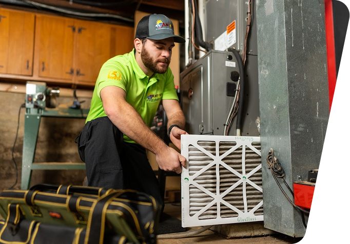 employee working on air duct